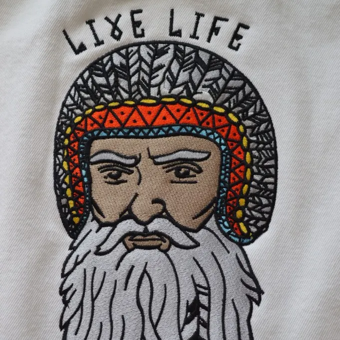 Illustrated bearded figure and the words Live Life In Your Own Lane embroidered on a garment back.