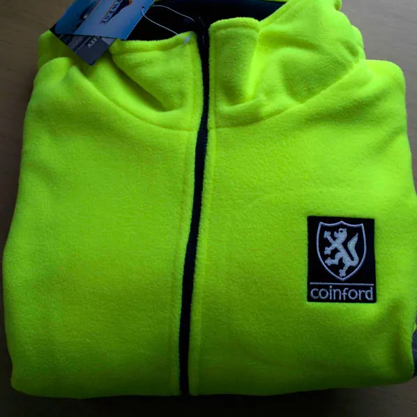 Lime hi-vis fleece jacket with a construction company logo embroidered on the chest.